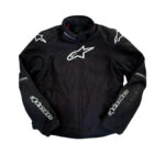 De face Veste moto Alpinestars XL en très bon état, textile, avec protections CE. Étanche et équipée d'une doublure amovible. Parfait pour une utilisation toutes saisons.